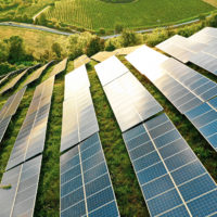 Solar panels fields on the green hills