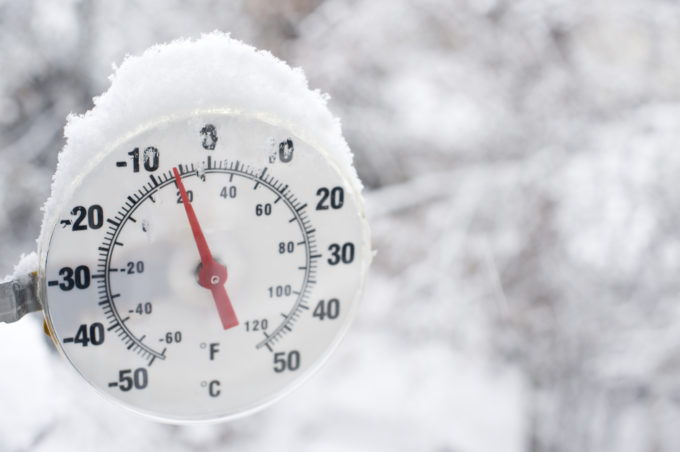 Photo of a thermometer with snow on