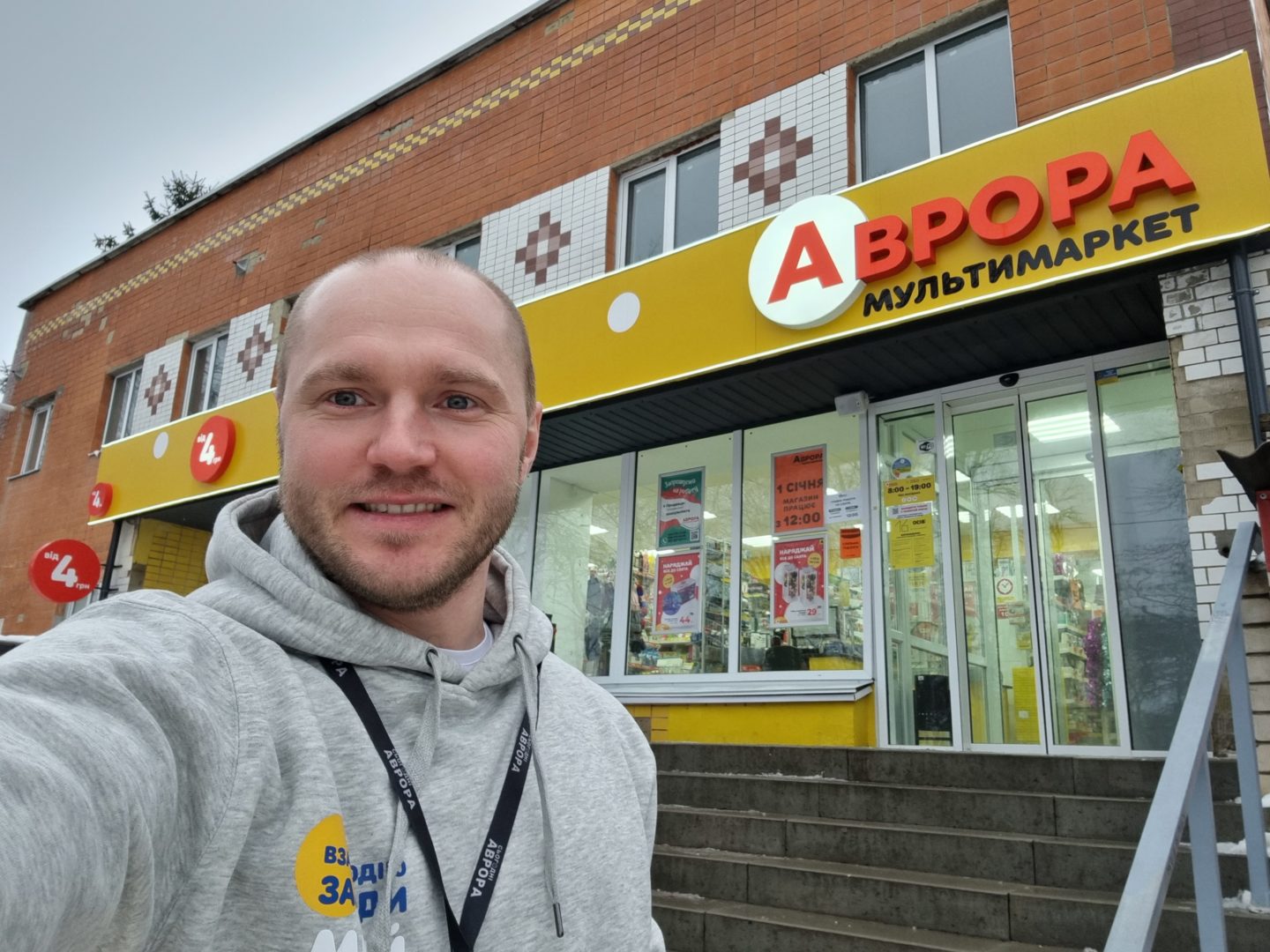 Avrora CEO Taras Panasenko stands in front of one of his stores in January 2022