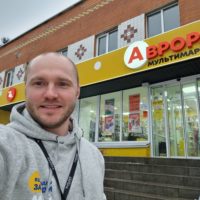 Avrora CEO Taras Panasenko stands in front of one of his stores in January 2022