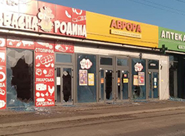 An explosion knocks out the glass of an Avrora storefront on 28 February 2022