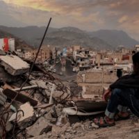 Kid looking at landscape in yemen