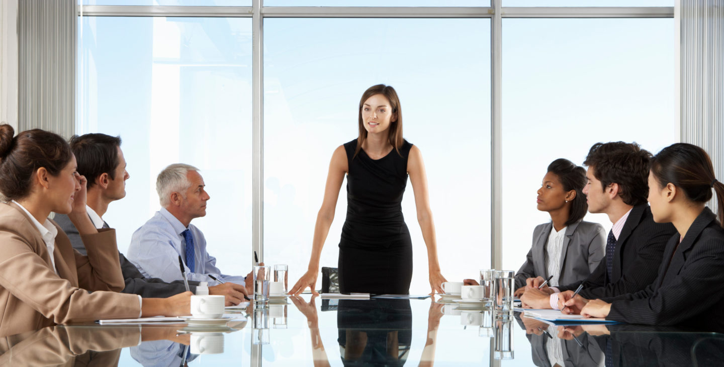 Women directing board meeting