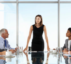Women directing board meeting