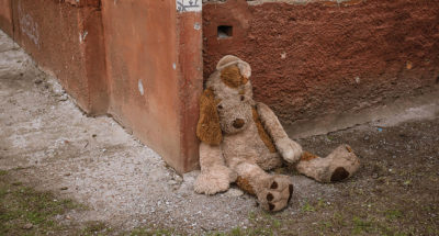 Teddy bear in a war zone