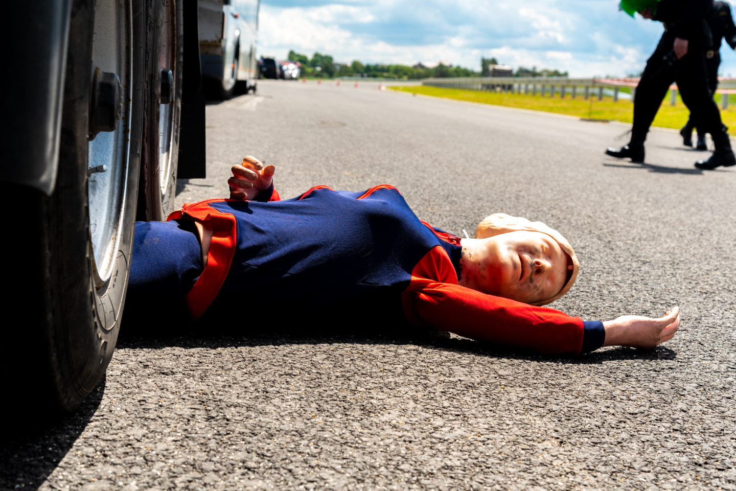 Car accident dummy on the ground