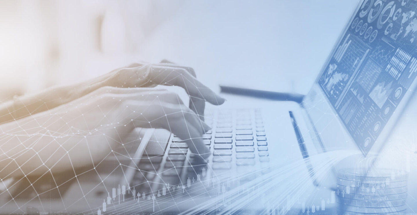 business people hand typing on computer laptop keyboard office lifestyle overlay with city and financial chart.