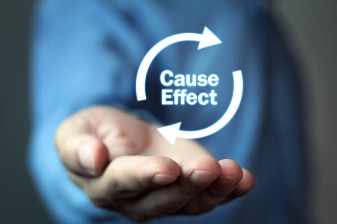 Man holding Cause Effect Arrows Information concept