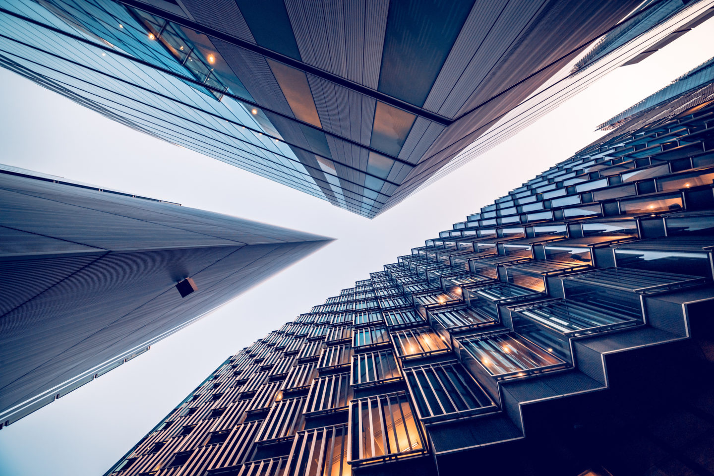 Looking directly up at the skyline of the financial district in central London – stock image Interest rates