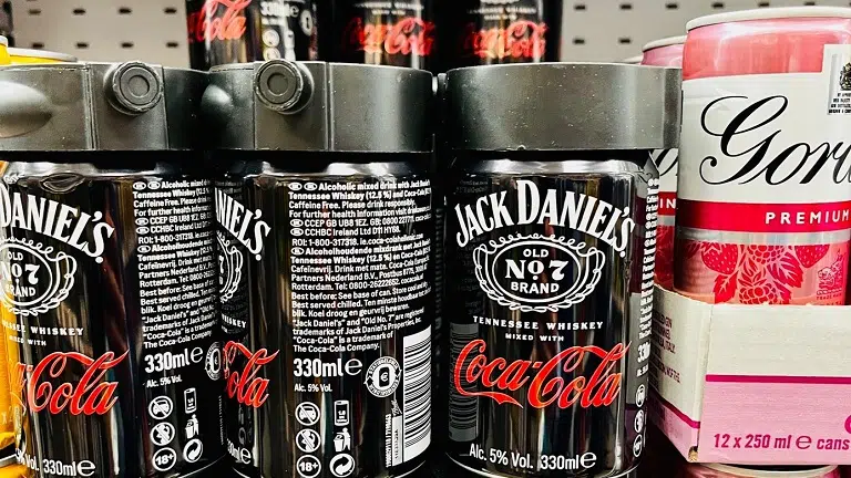 Jack_CocaCola_Website - IMD Business School Image showing cans of Jack Daniels with the Coca-Cola logo on them. - IMD Business School