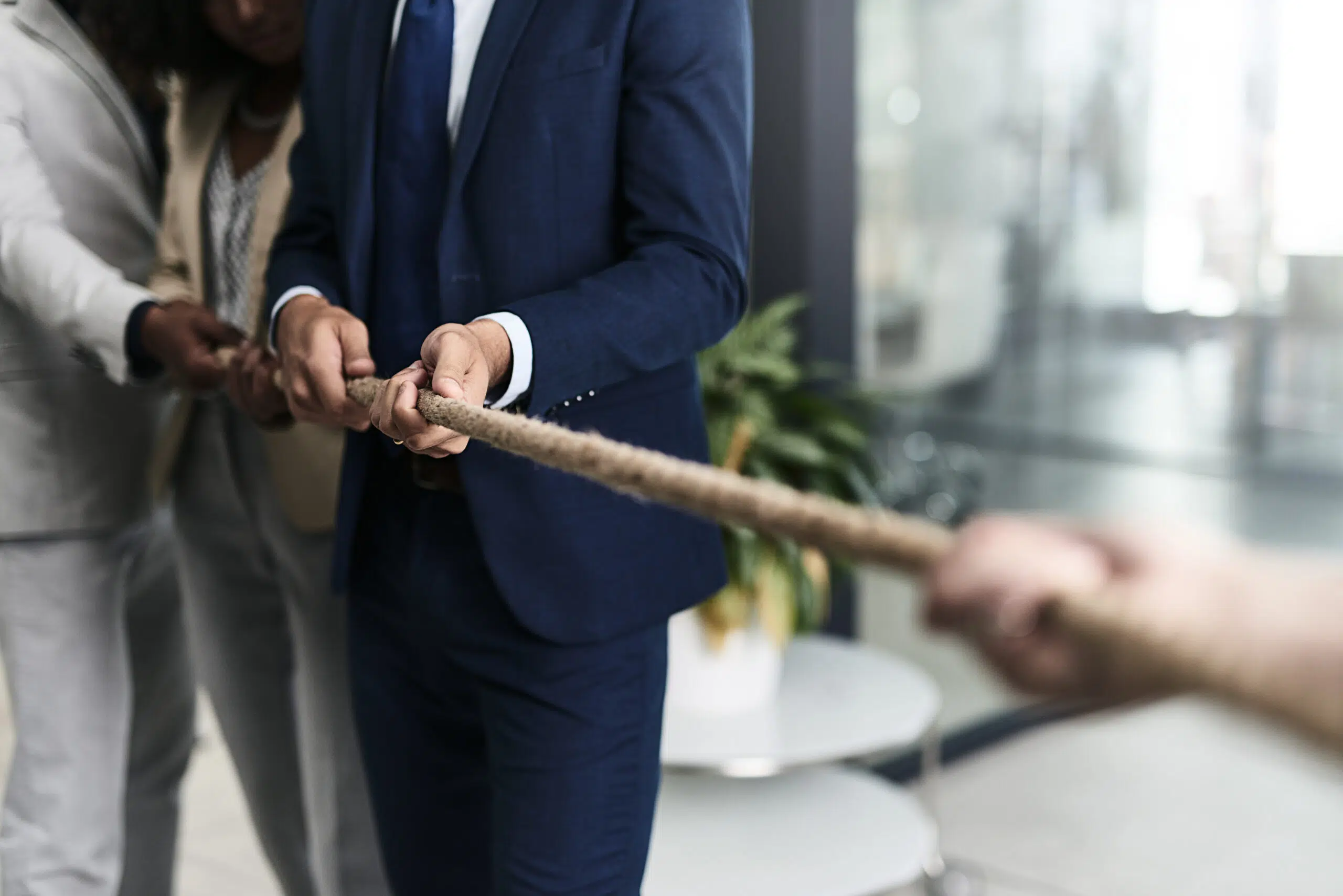 Employee growth vs company performance: resolving the tug of war