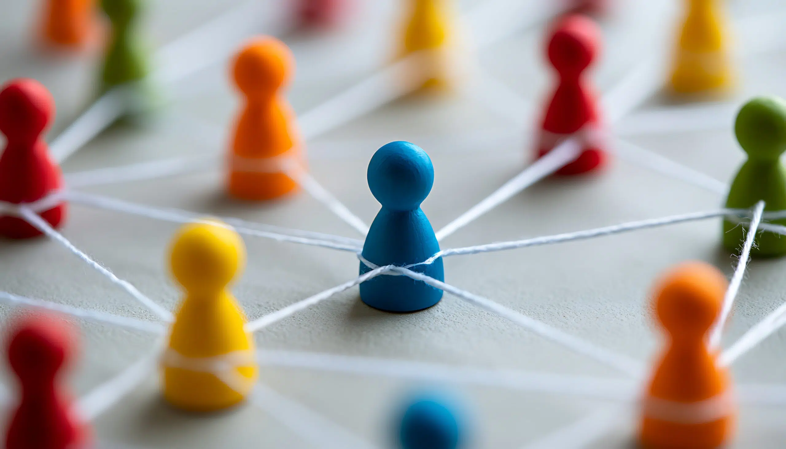 Effective team communication and delegation strategies business environment miniature figures abstract view - IMD Business School