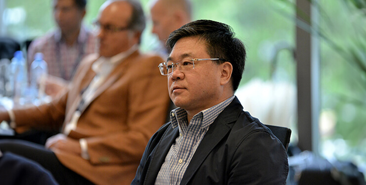 Man board member in a classroom at IMD business school - IMD Business School