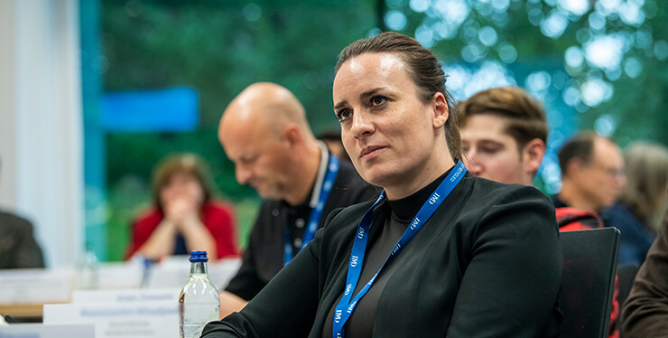 Woman board member in a classroom at IMD business school - IMD Business School