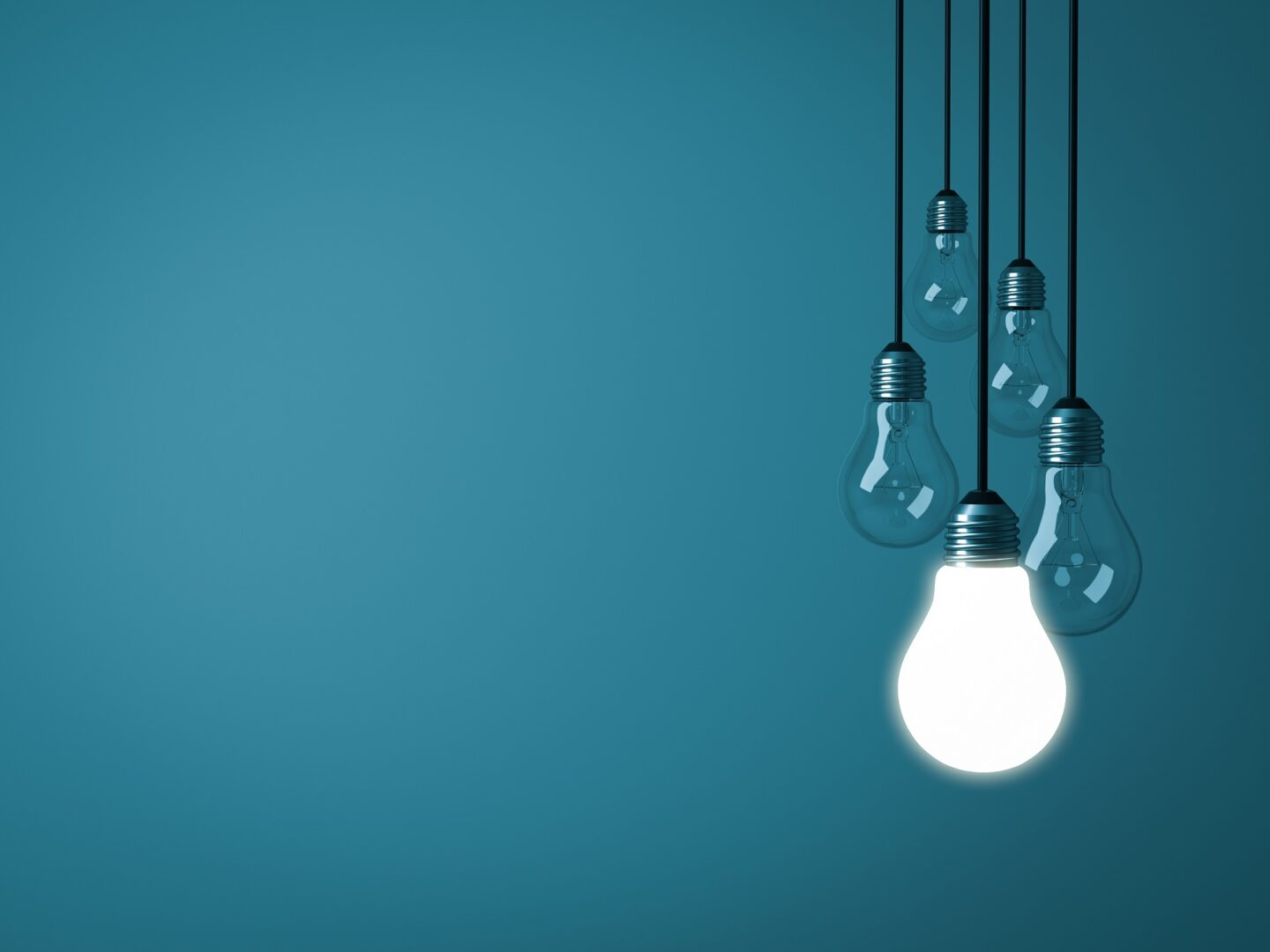 One hanging light bulb glowing on dark green pastel color background with unlit incandescent glass bulbs . 3D rendering.