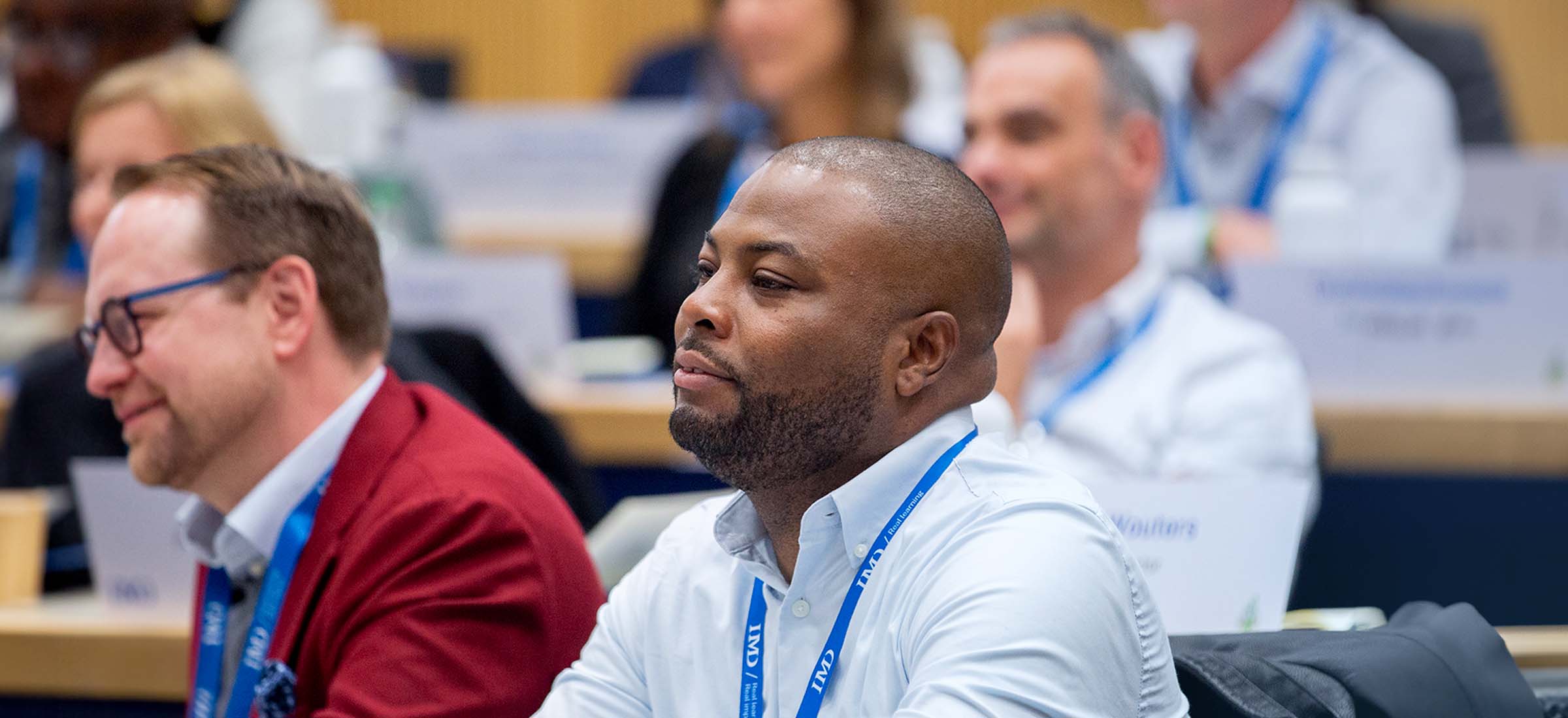 20231207-Degrees-Programs&Solutions-TopBanner-BlueFilter-Tablet-2400×1100 - IMD Business School