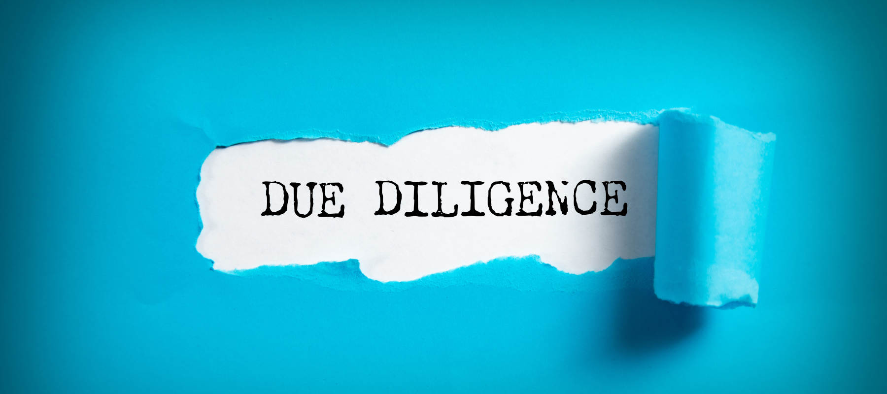 Due diligence text on the torn paper