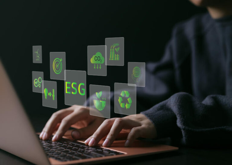 ESG environmental social governance investment business concept. woman uses a computer to analyze ESG data. ESG icons pop up on virtual screen in business sustainability investment strategy concept.