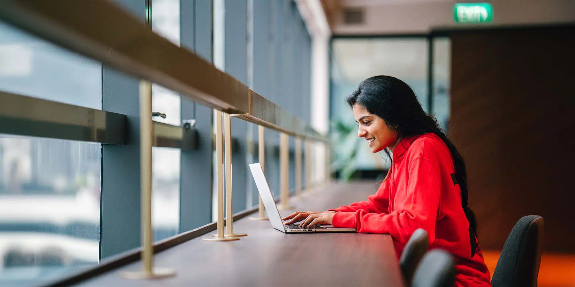 mba woman studing on imd campus - IMD Business School