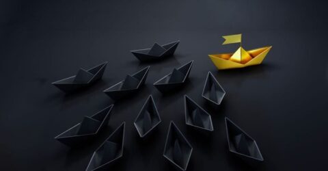 Paper boats illustrating a ship battle - IMD Business School