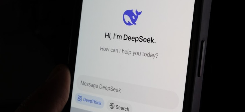 Deepseek logo on a phone screen - IMD Business School