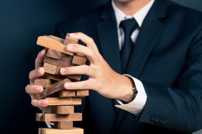 Businessman Builds a Tower
