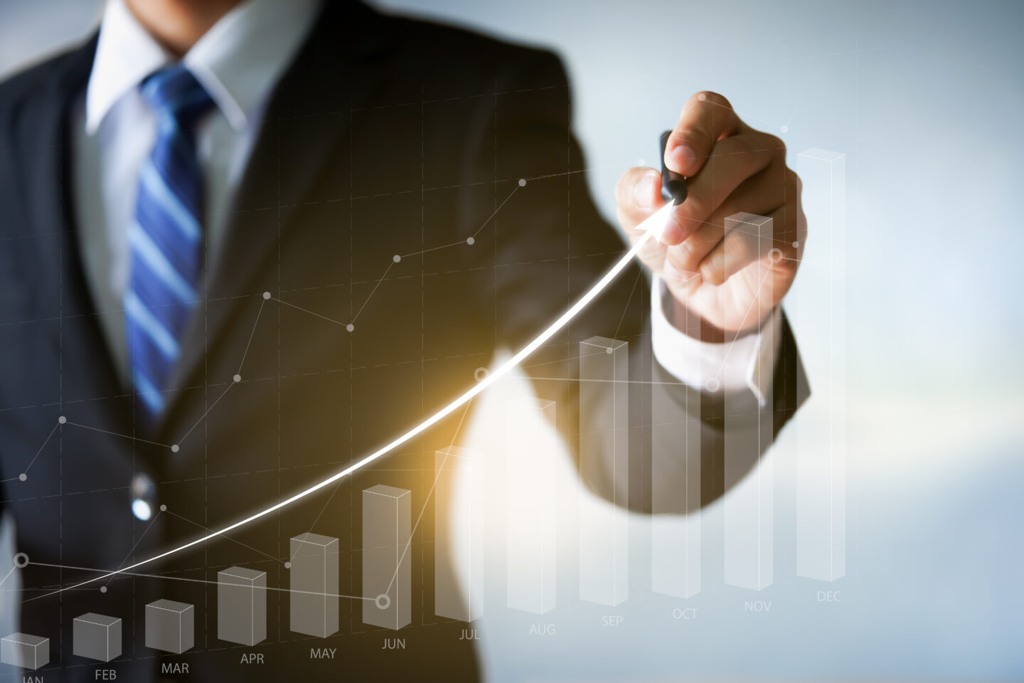 Businessman pointing arrow graph business analytics and financi