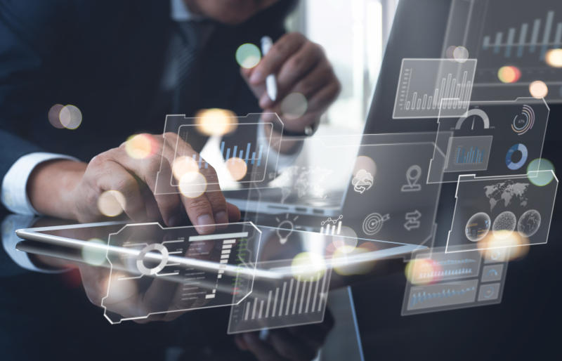 Data scientists Programmer using digital tablet and laptop comp