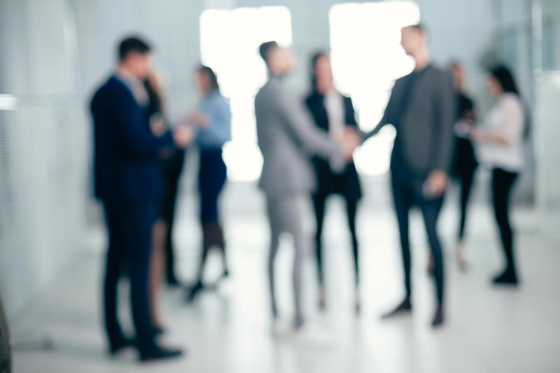 background image of a group of business people in the office lobby. business background
