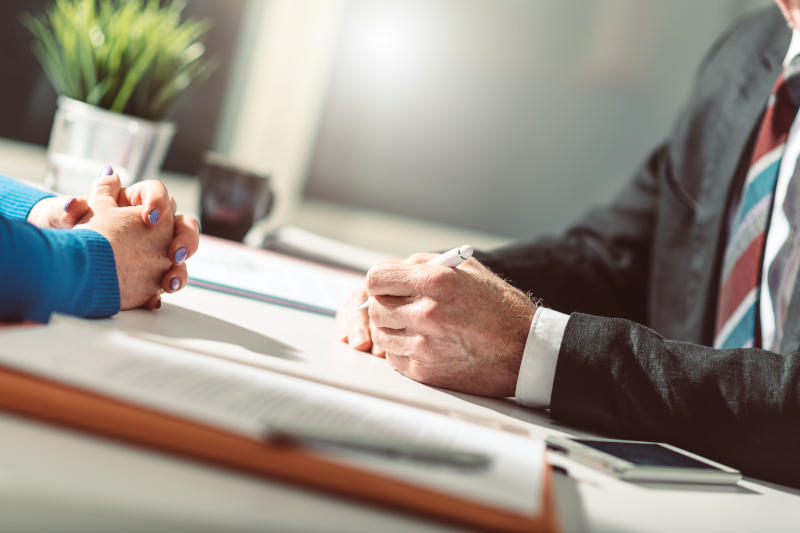 Situation of business negotiation between businesswoman and businessman, light effect