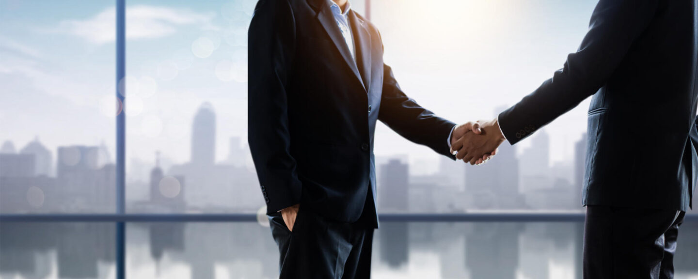 successful negotiate and handshake concept two businessman shak