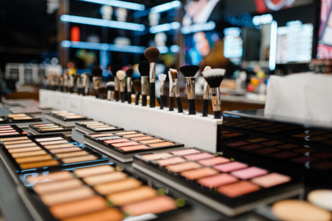 Showcase with powder and shadows cosmetics store