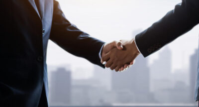 successful negotiate and handshake concept two businessman shak
