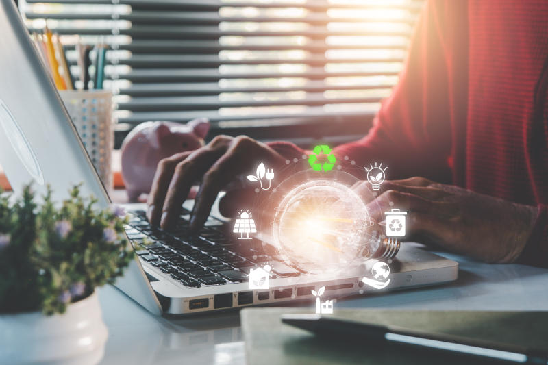 ESG concept of environmental light bulb with esg icon on virtual screen social and corporate governance concept ESG concept of environmental light bulb with esg icon on virtual screen social and corporate governance concept