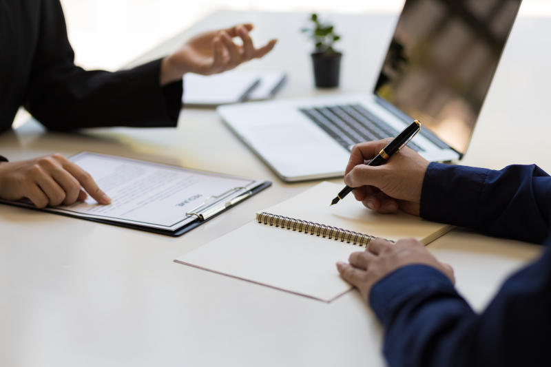 Businesspeople talking and interviewing for office jobs