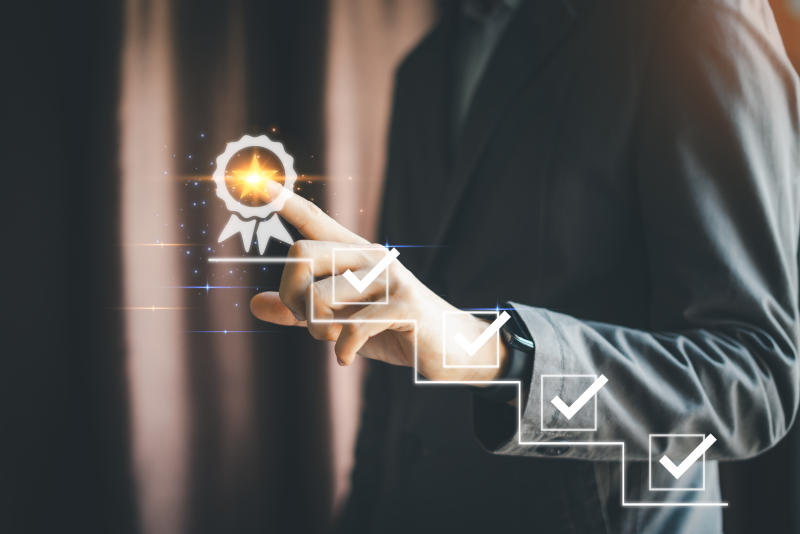 Achievement Pathway digital checklist with glowing badge symbolizing goal completion and success in a business setting coach the way of setting goals objectives and success