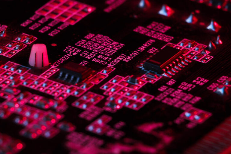 Computer microchips close-up Digital technology Pink light
