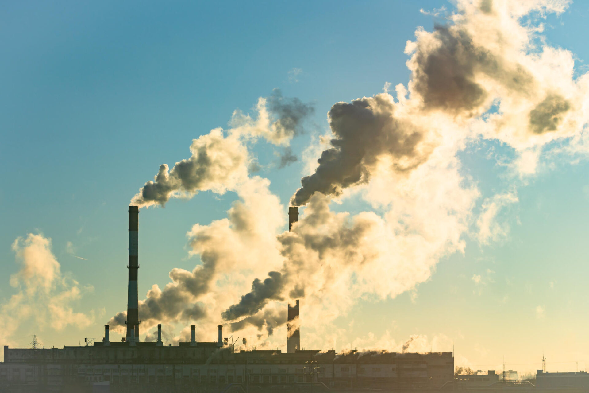 Pipes with smoke industrial production plant air pollution