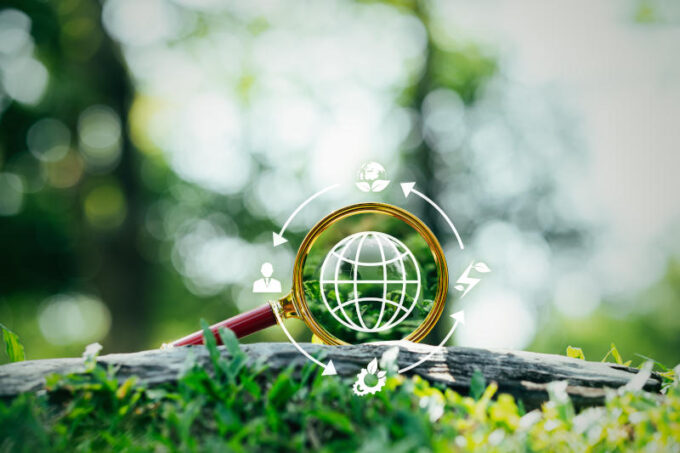 Circular economy concept recycle environment reuse production waste consumer resources icon on magnifying glass infinite eternity Circular economy for business growth and sustainable future