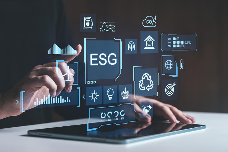 ESG concept with holographic icons on tablet highlighting environmental business and growth strategies