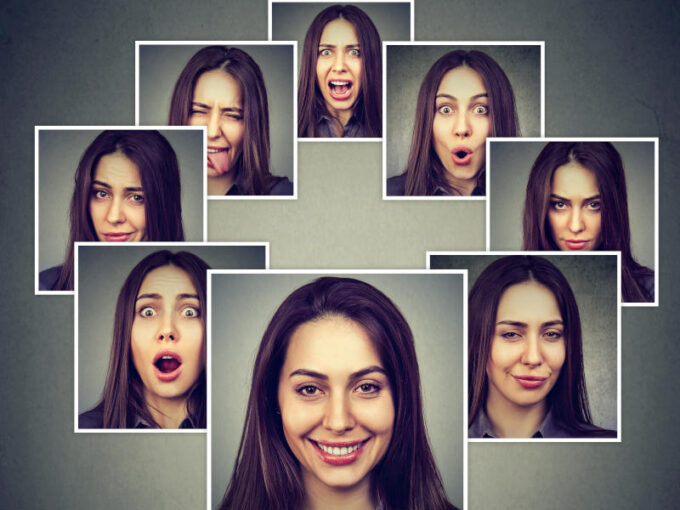 Portrait of a happy masked woman expressing different emotions