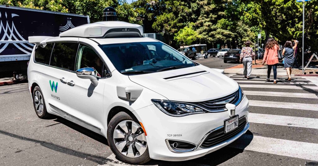 image of a waymo driverless taxi car
