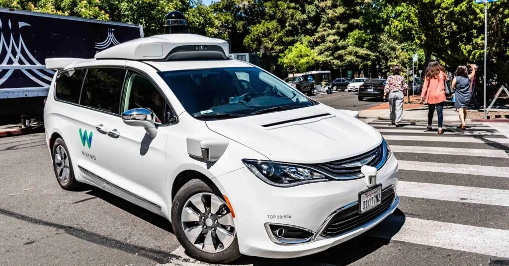 image of a waymo driverless taxi car - IMD Business School