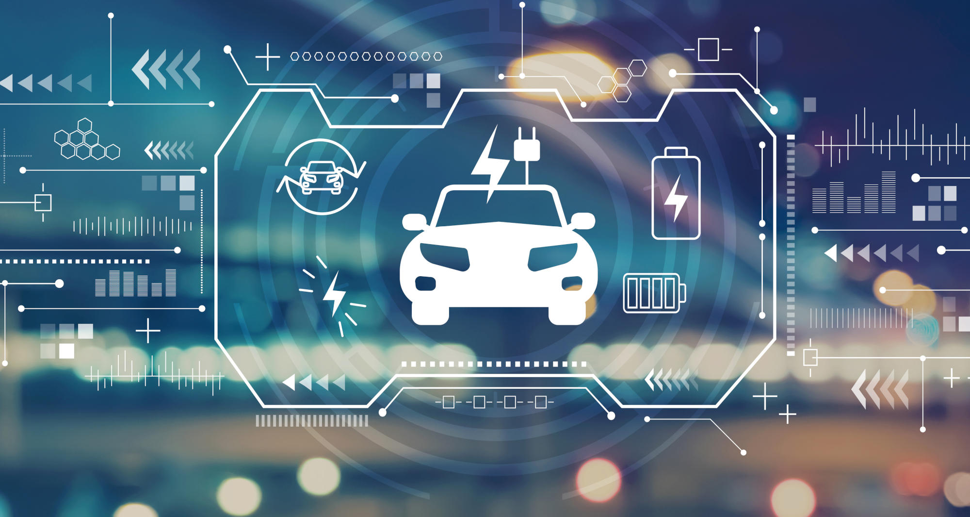 EV with blurred city lights