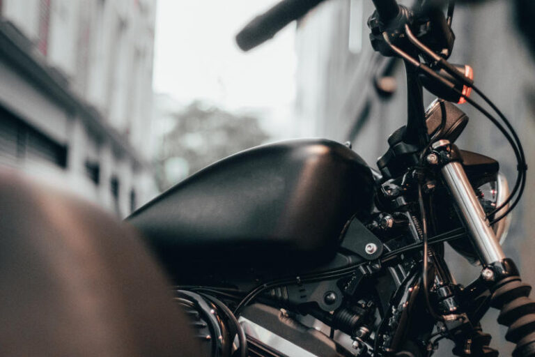 Closeup of motobike chopper parts details with warm light Personal transport and road spirit ride concept