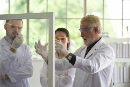Scientists are working on scientific tests in the lab Science force Perform chemical testing and analysis or Experimental production of drugs and vaccines - IMD Business School