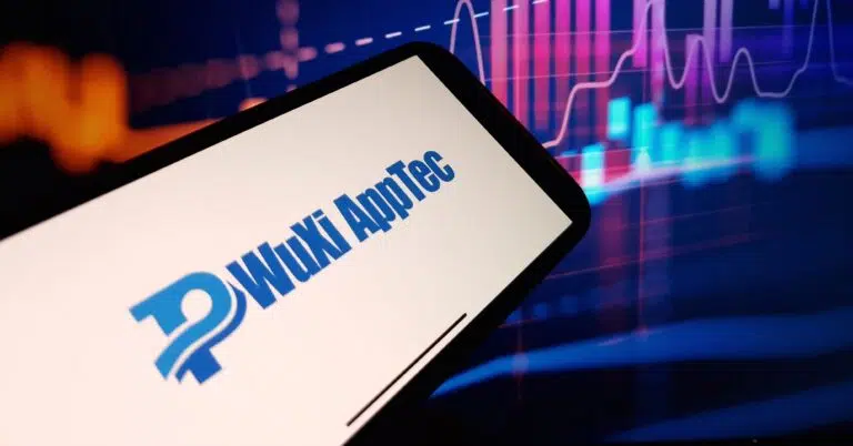 - IMD Business School Phone screen showing text - WuXi AppTec - IMD Business School