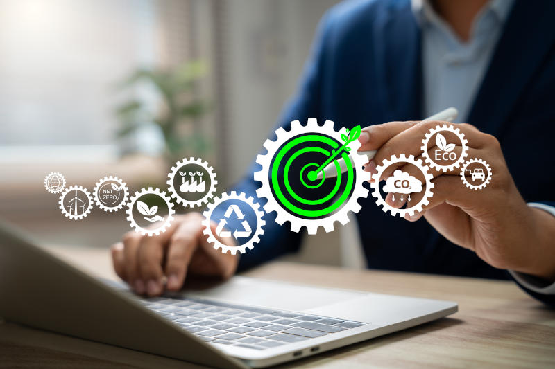 Sustainable business and ESG investmentBusinessman using laptop for environmental governance researchGreen economy RenewableBusiness leader analyzing sustainability reports and ESG policies