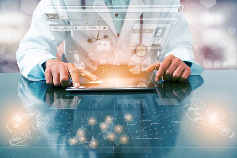 Medical Healthcare Concept - Doctor in hospital with digital medical icons graphic banner showing symbol of medicine medical care people emergency service network doctor data of patient health