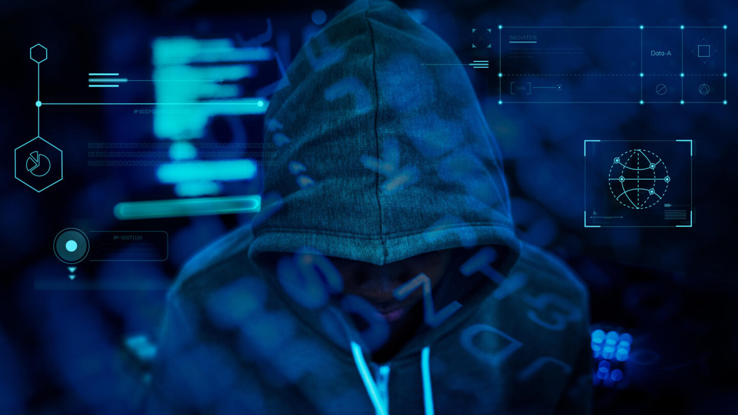 Hacker with their hood up